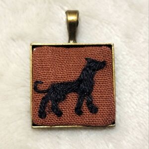Handmade Embroidered Black And Brown Dog Silhouette Pendant